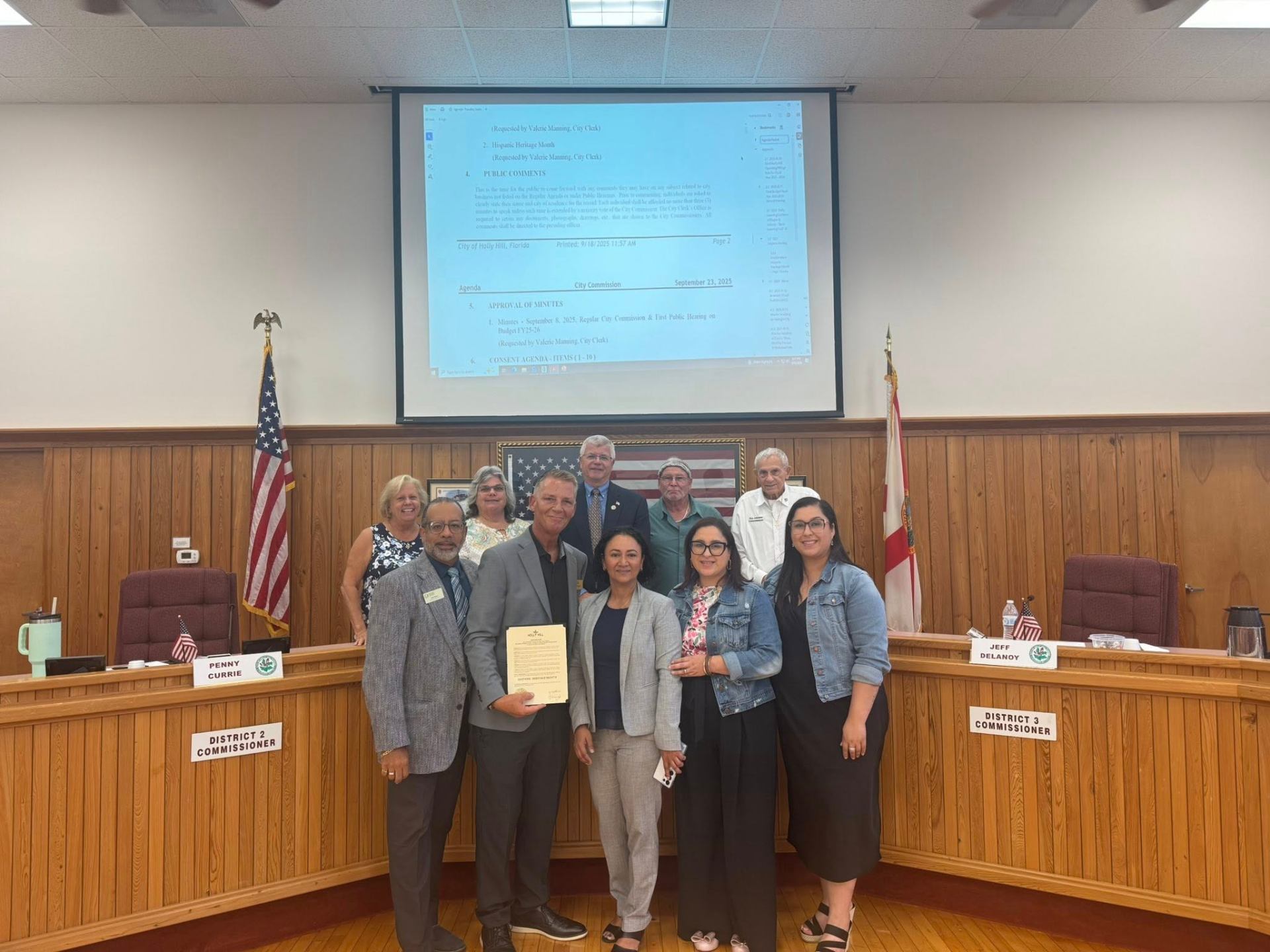 Carmen Ruiz with the Holly Hill City Commission receiving the Hispanic Heritage Month proclamation